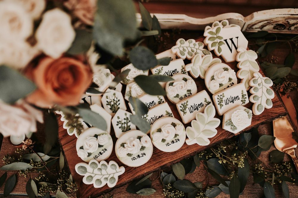 Whispering Oaks wedding reception with candlelight and wood tables