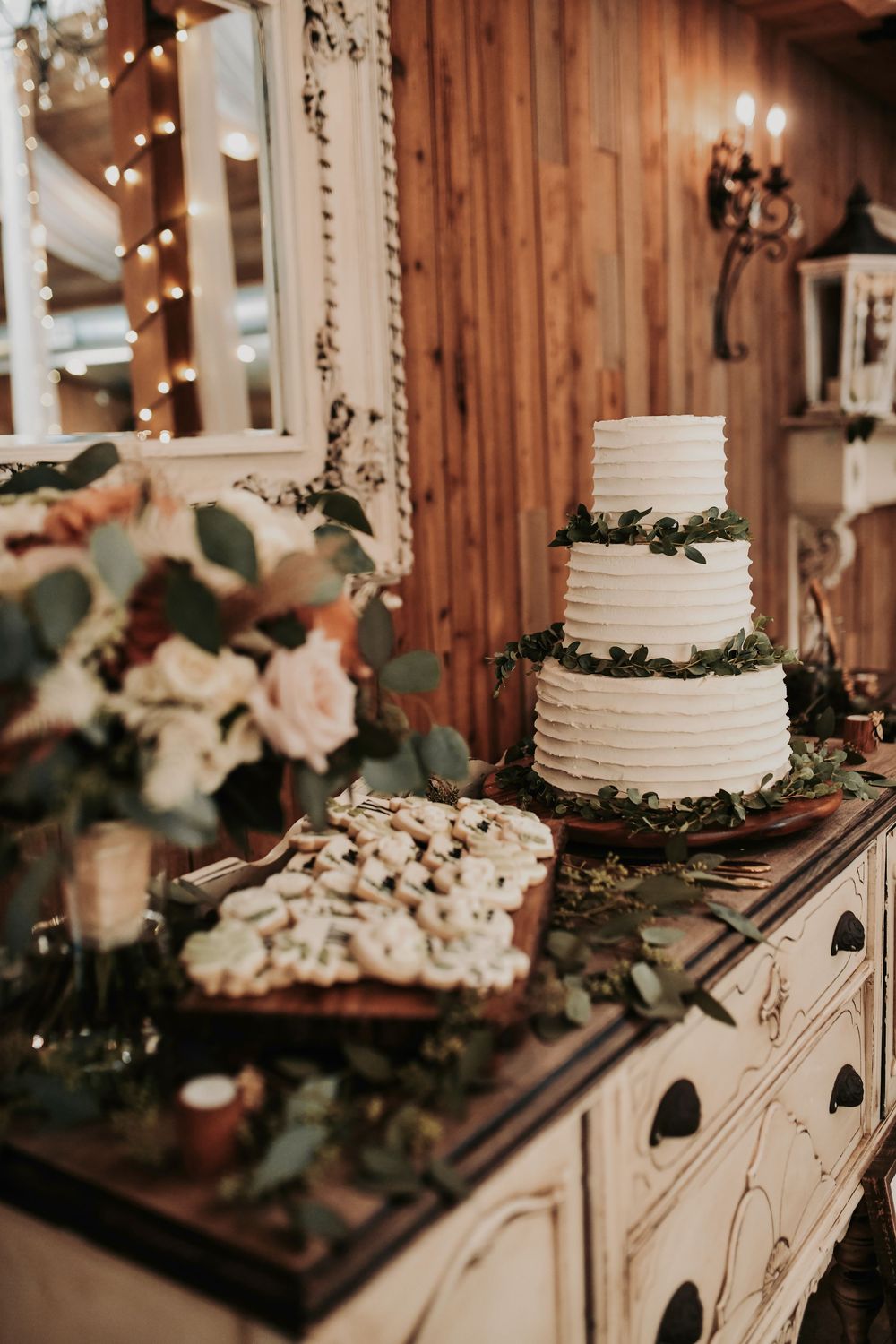 Warm candlelit reception atmosphere captured by April Pinto Photography
