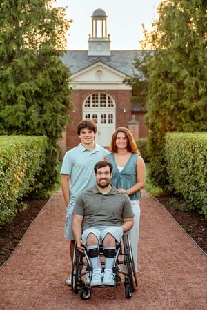 Three outdoor photos along a brick pathway with a wheelchair and historic building in background at sunset.