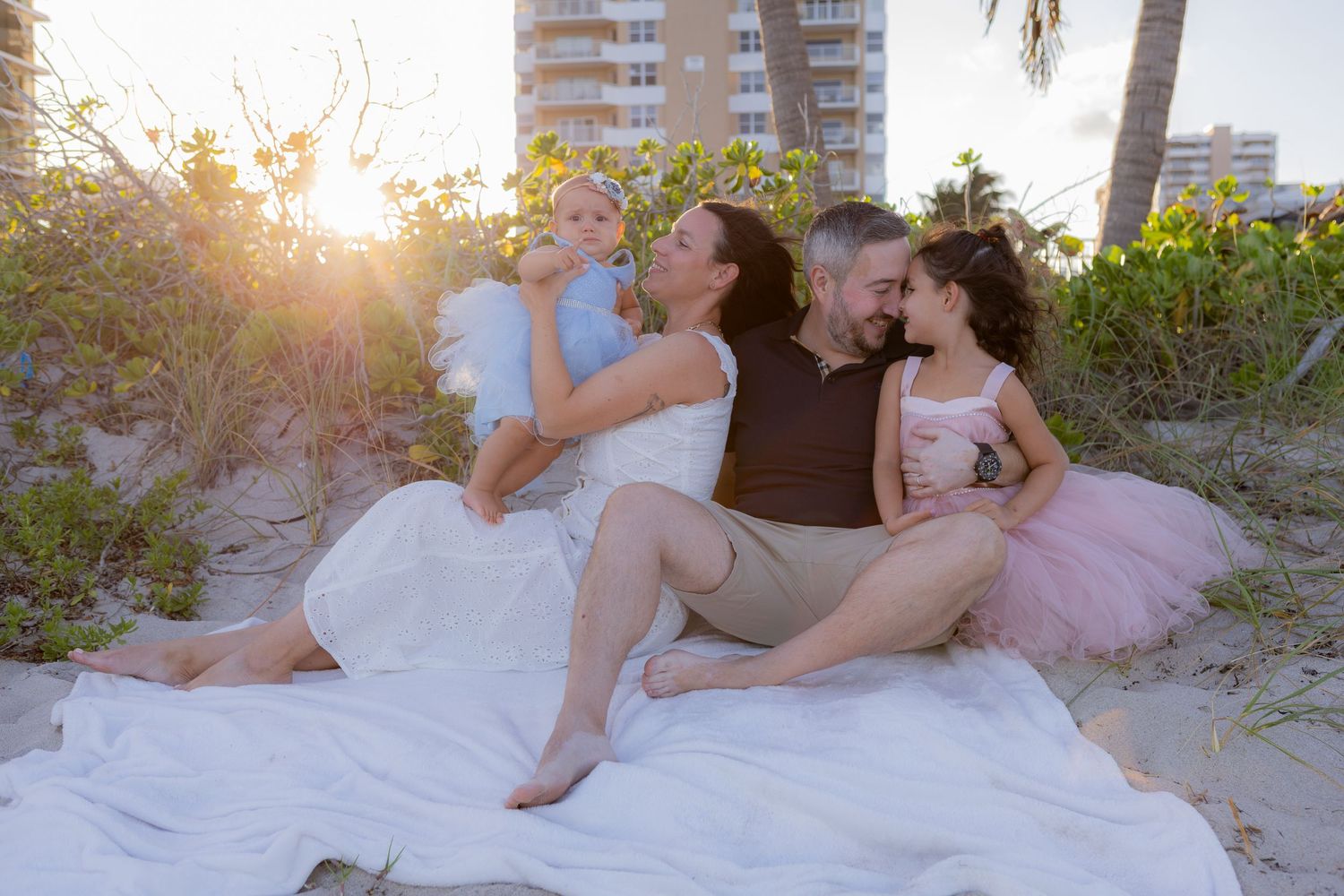 Family photoshoot picture in Hallandale Beach Florida, sunset vibes, taken by Wanderlust Studios