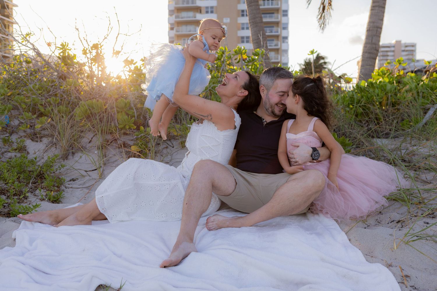 Family photoshoot picture in Hallandale Beach Florida, sunset vibes, taken by Wanderlust Studios