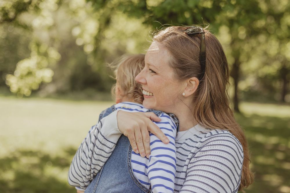 mum and toddler hug