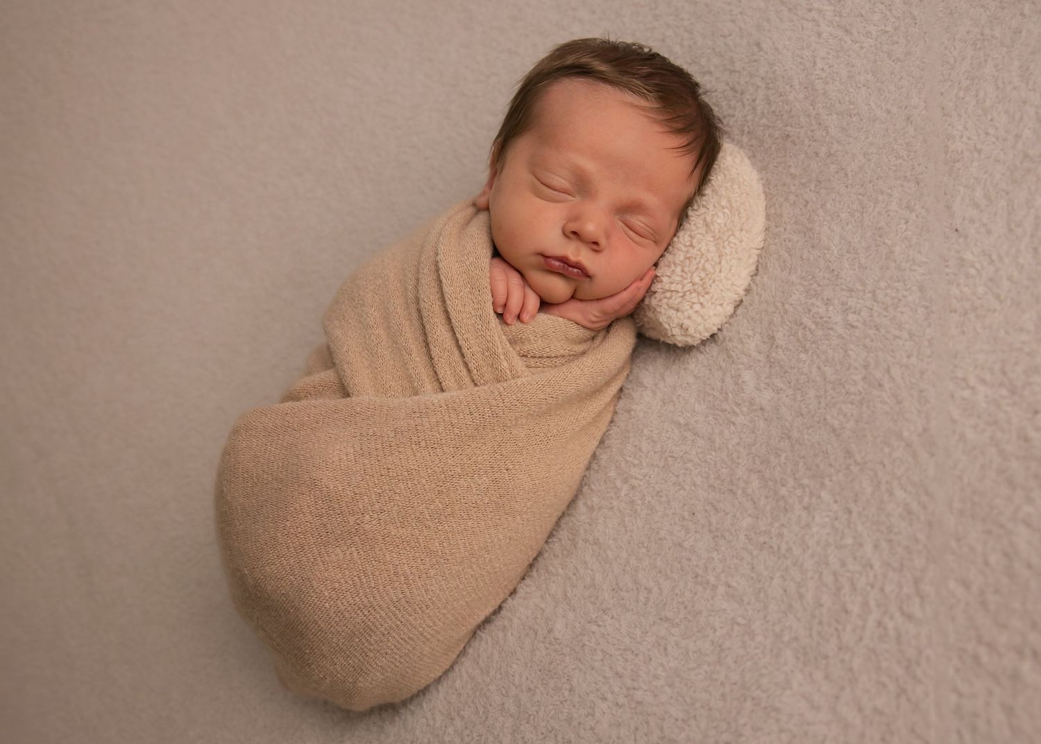 Salt Lake City studio newborn photographer posing baby safely and naturally