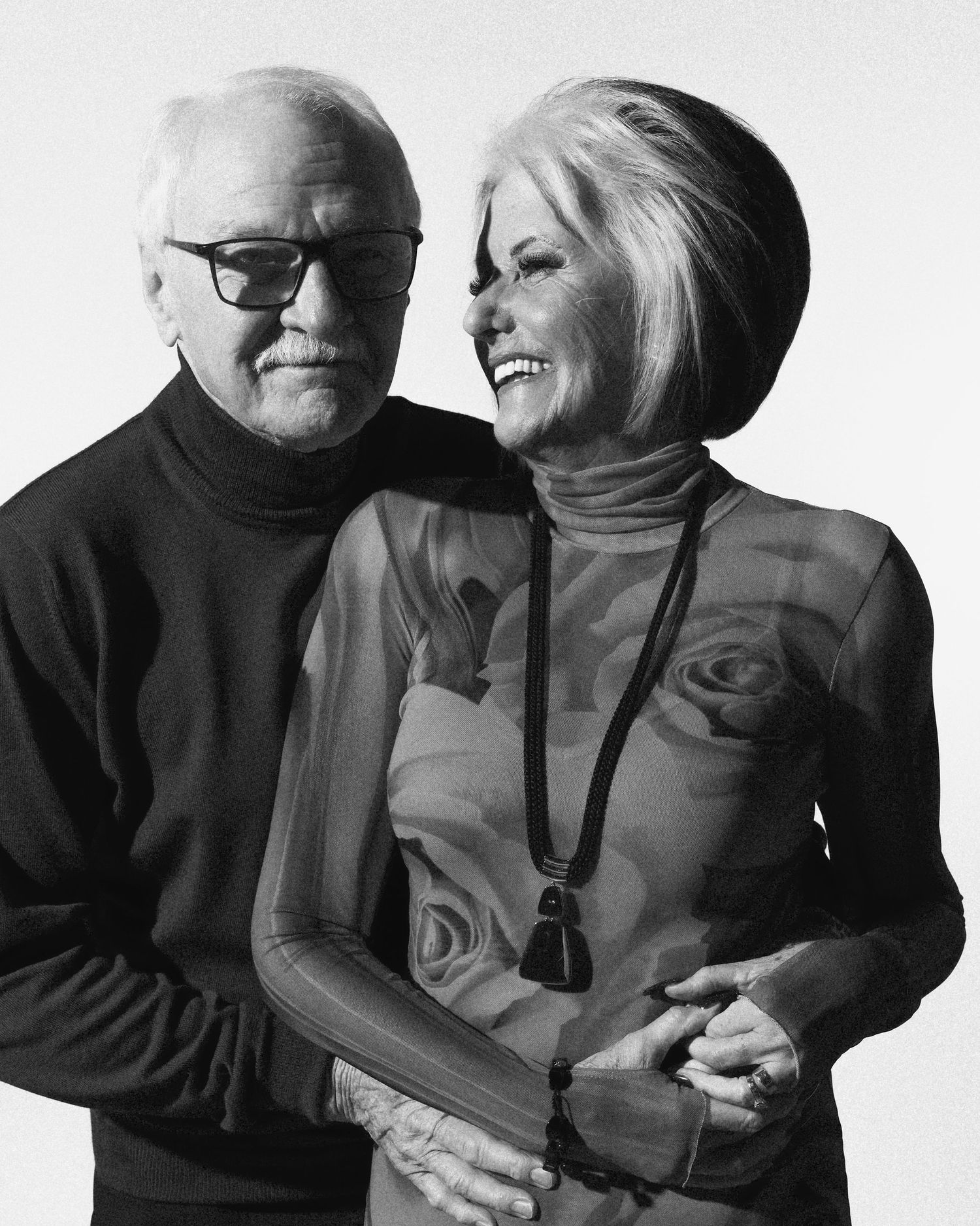 Black and white portrait series showing intimate moments between two people. Mini Couple Shoot