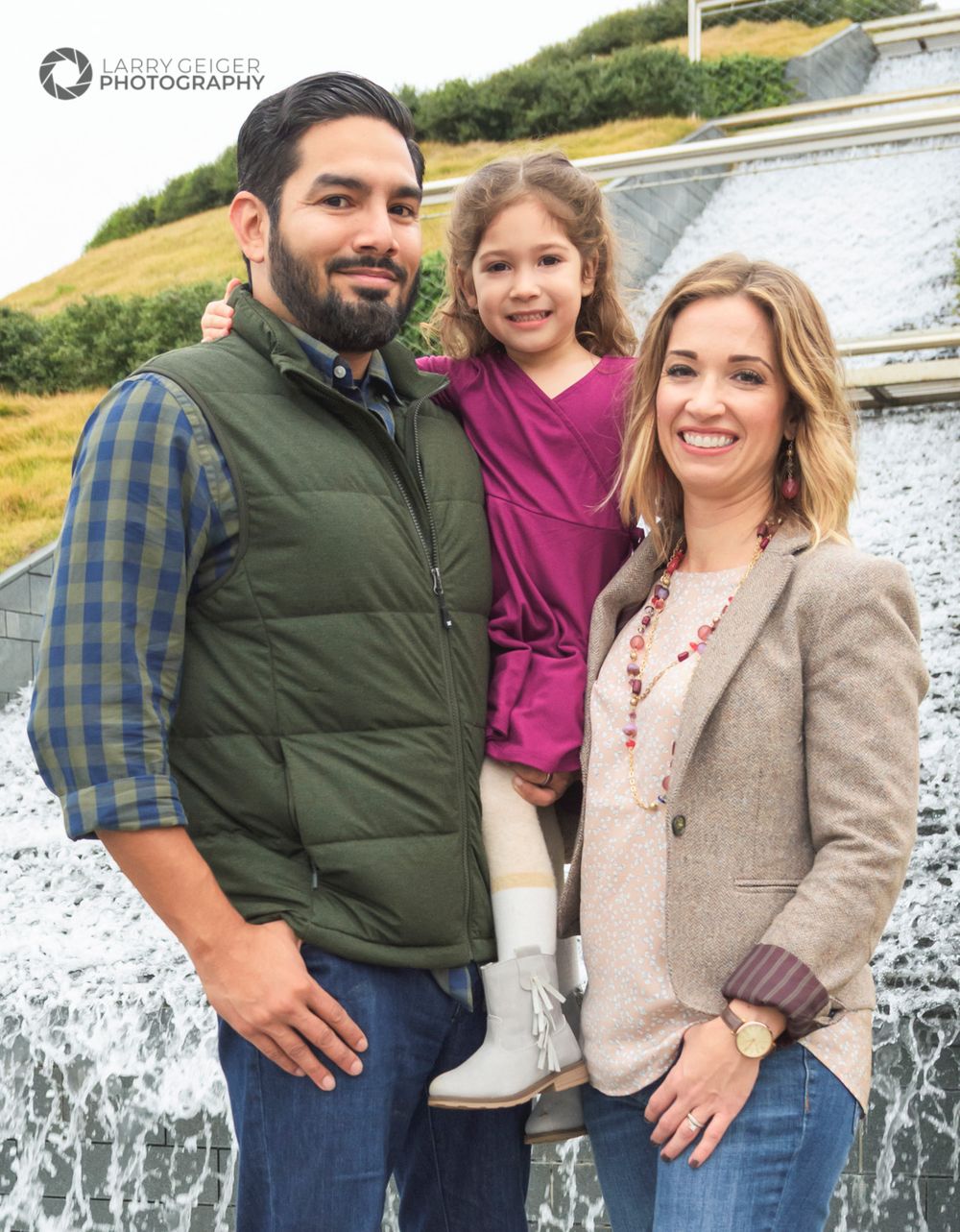 Family portrait outdoors in Houston, candid moment during session.