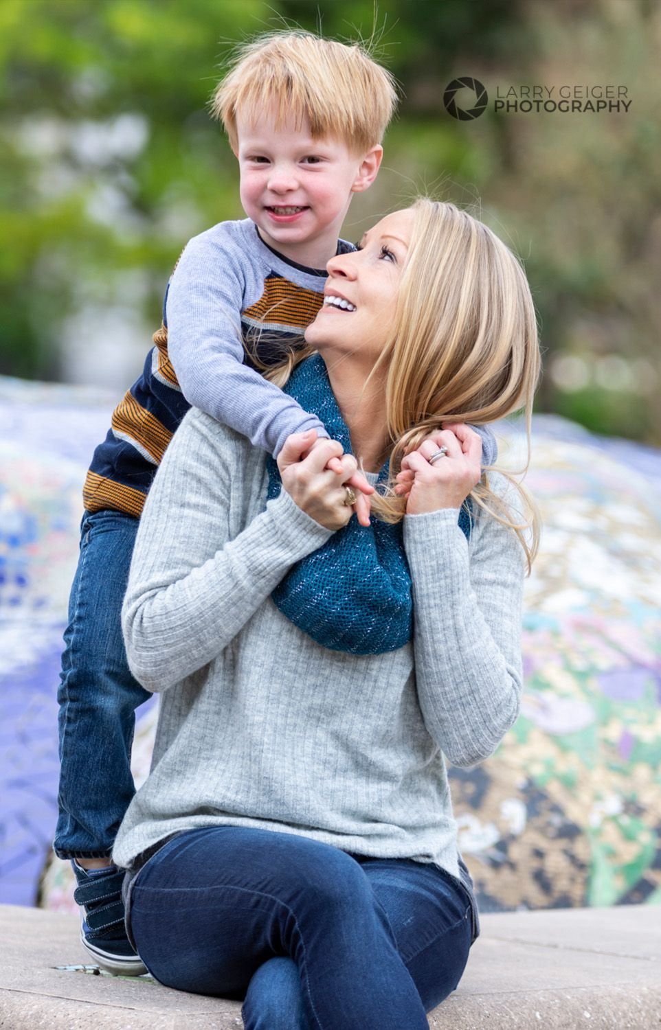 Mother and son laughing during lifestyle session.