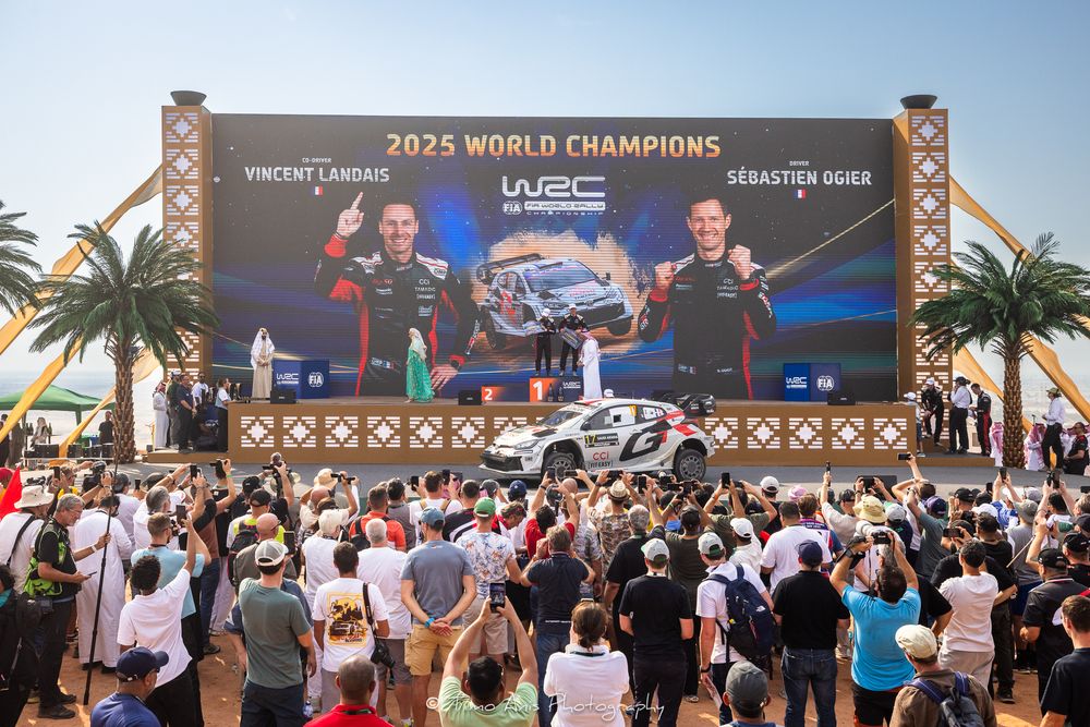 Crowd of fans gathered outside a stadium with palm trees and 2025 World Champions banner displayed.