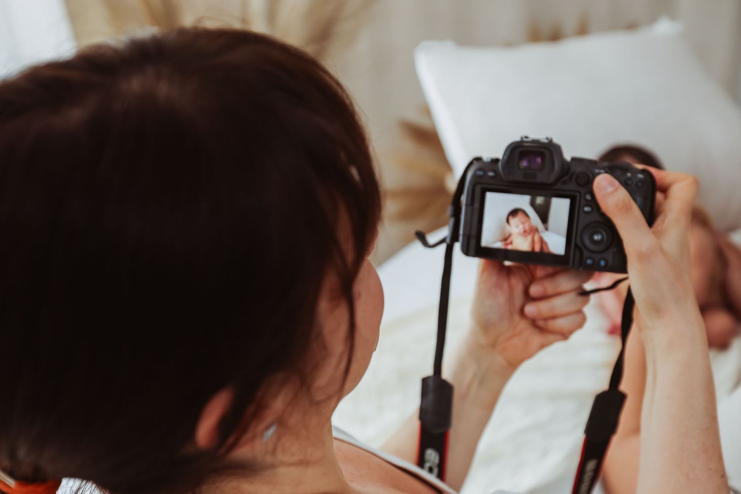 Behind the scenes photography session setup with camera equipment.