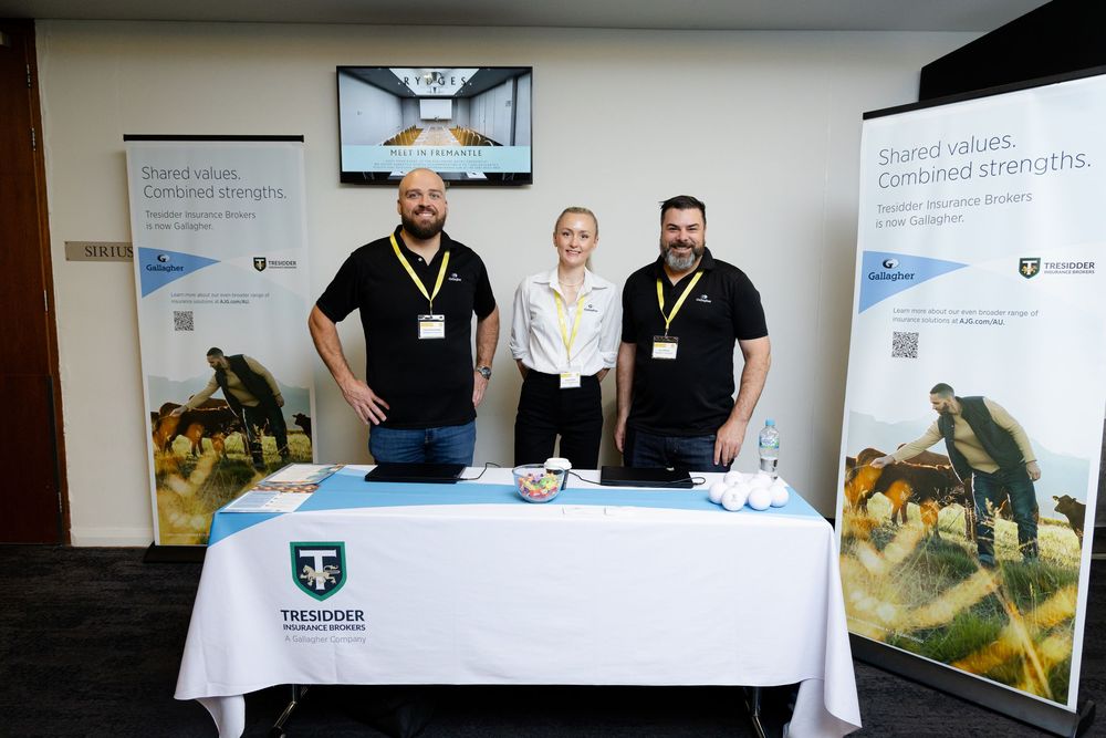 Conference attendees gather at professional networking event with Fremantle Conference Photographer