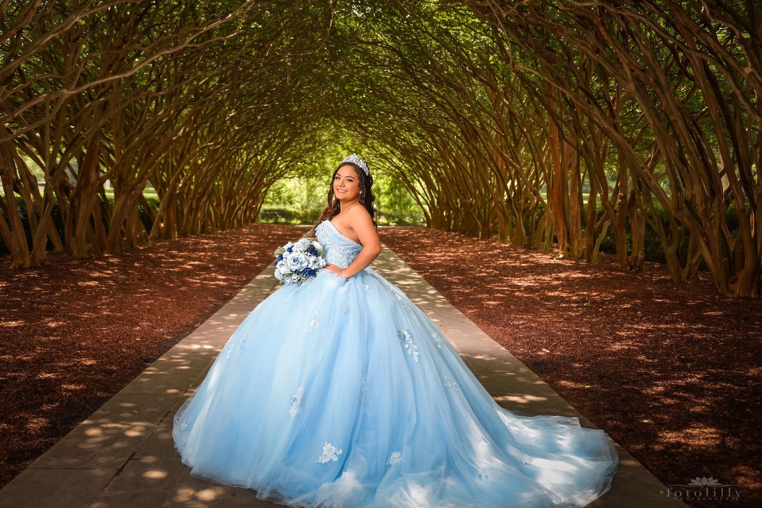 Outdoor quince photography session in Dallas Fort Worth with flowing quince dress