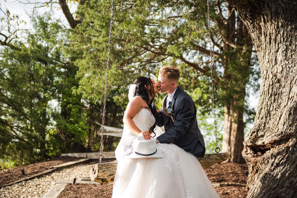 A romantic wedding photo sequence showing a couple in formal attire walking through a wooded forest setting.