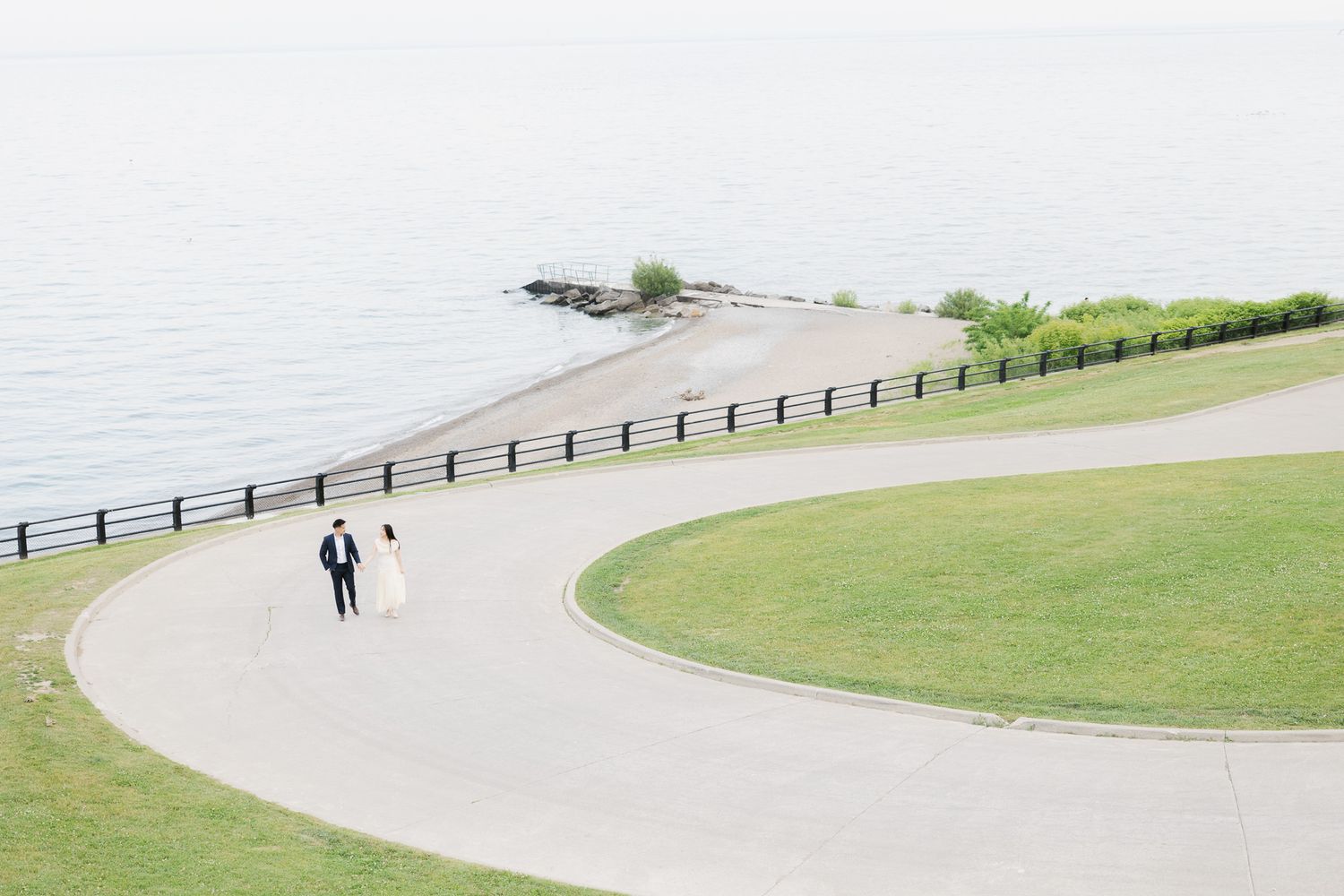 Bride and groom walking hand-in-hand – Toronto wedding photography