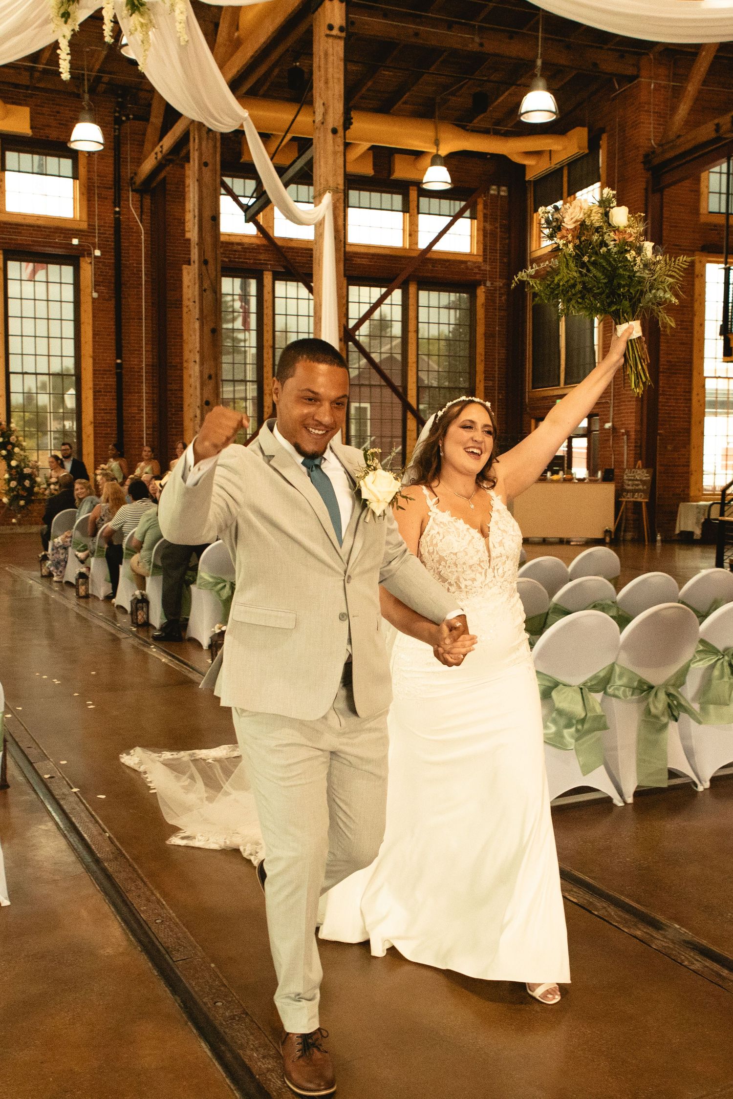 Celebrating saying i do while walking down the isle