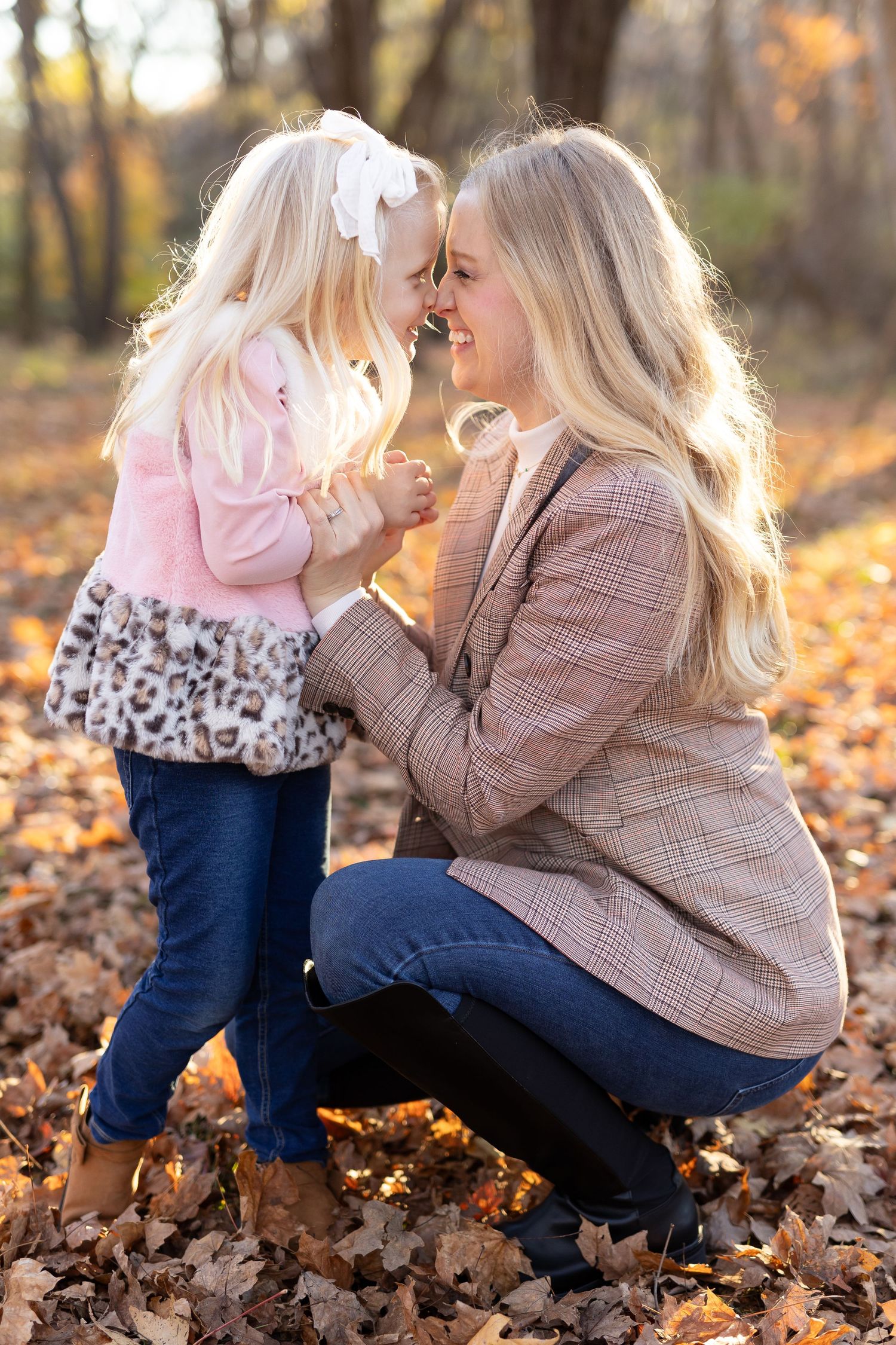 Mom and daughter sharing a smile together