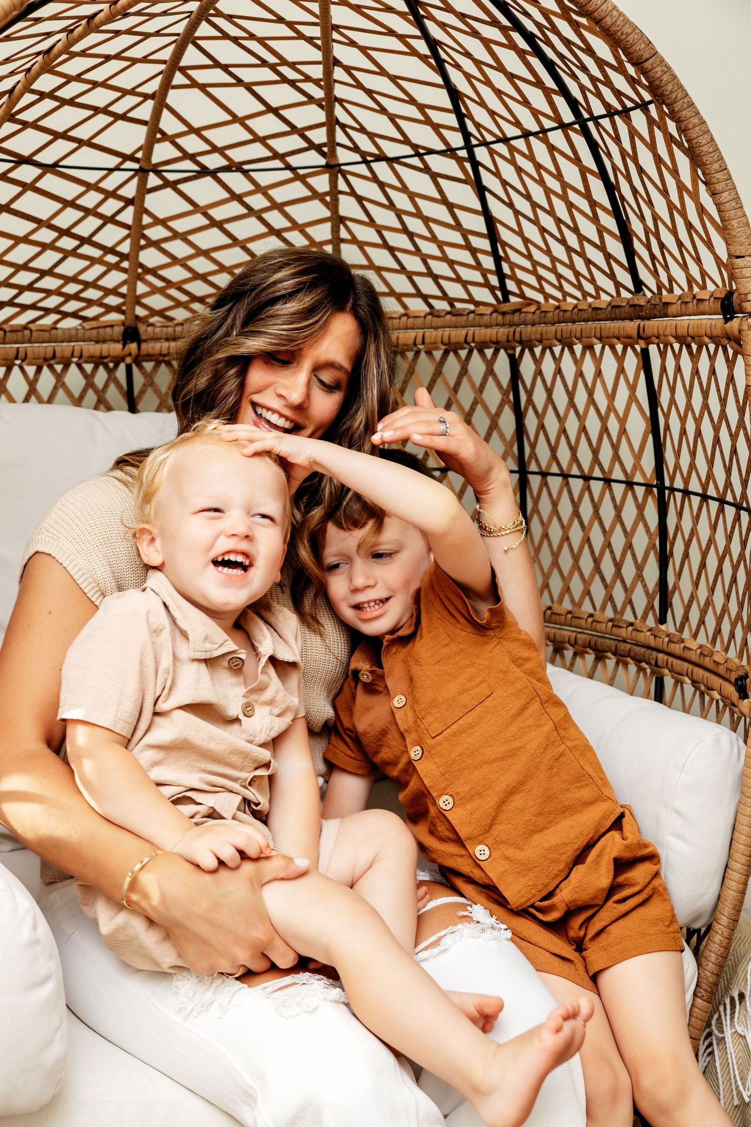Three candid photos of people relaxing together in a cozy wicker chair, sharing joyful moments in natural lighting.