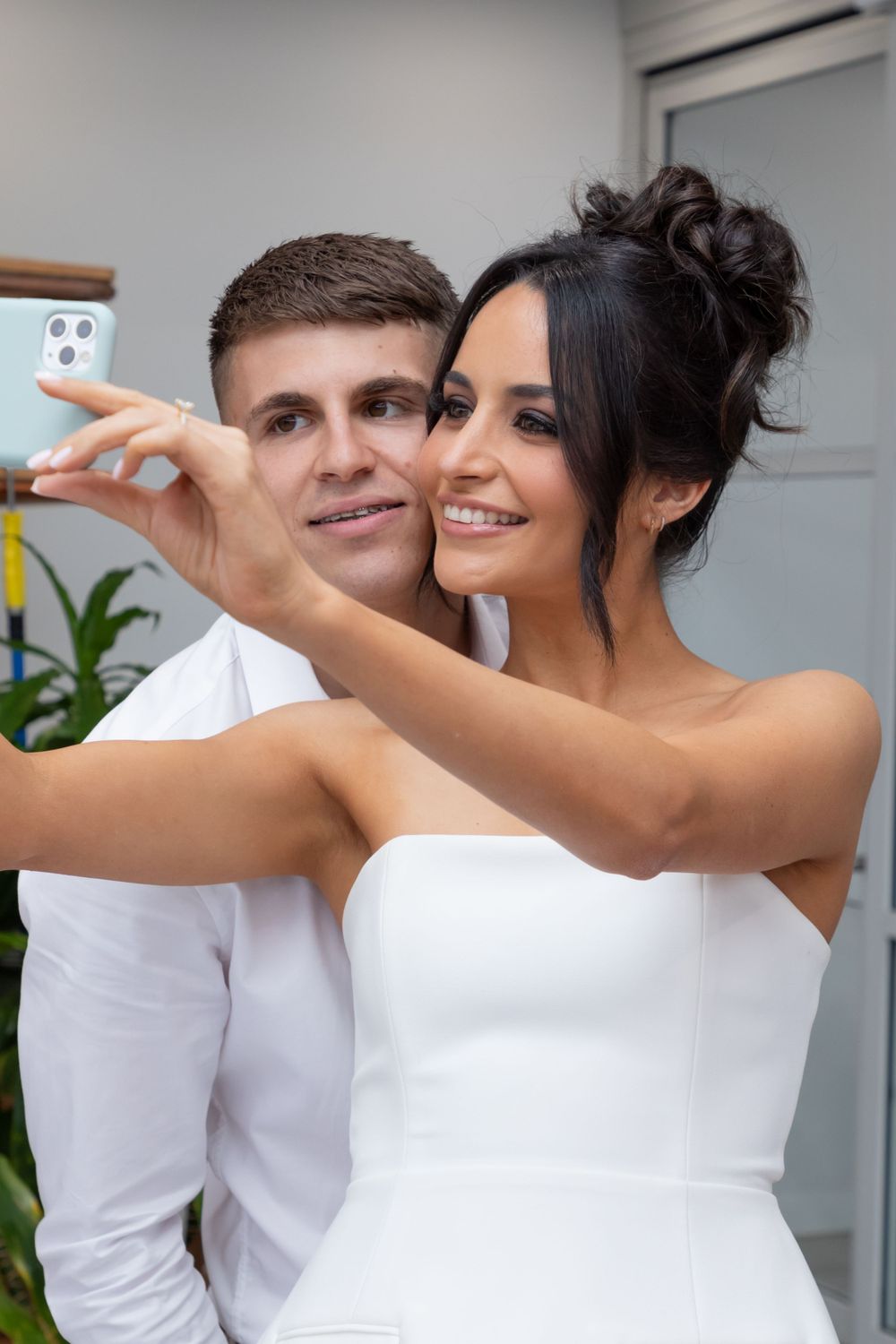 engagement photos of couple taking a selfie