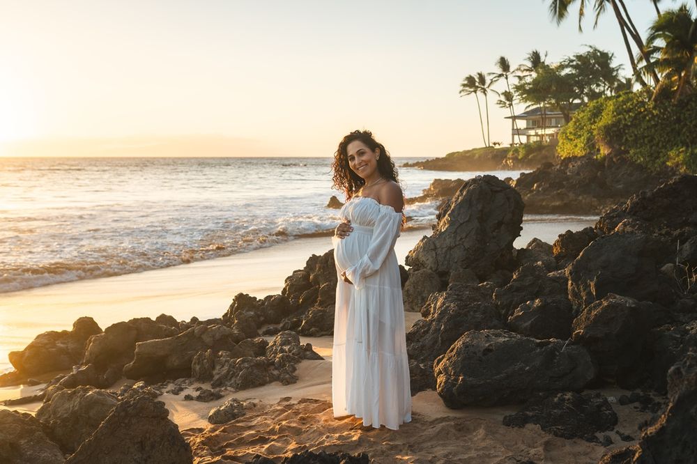 Maternity couple sunset photo at Poolenalena beach, Wailea, on Maui Hawaii