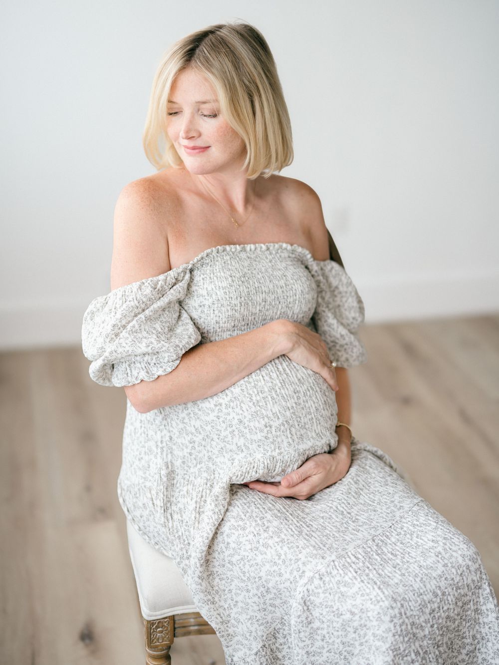 Soft neutral studio wardrobe for maternity portraits at Monmouth County NJ photography studio.