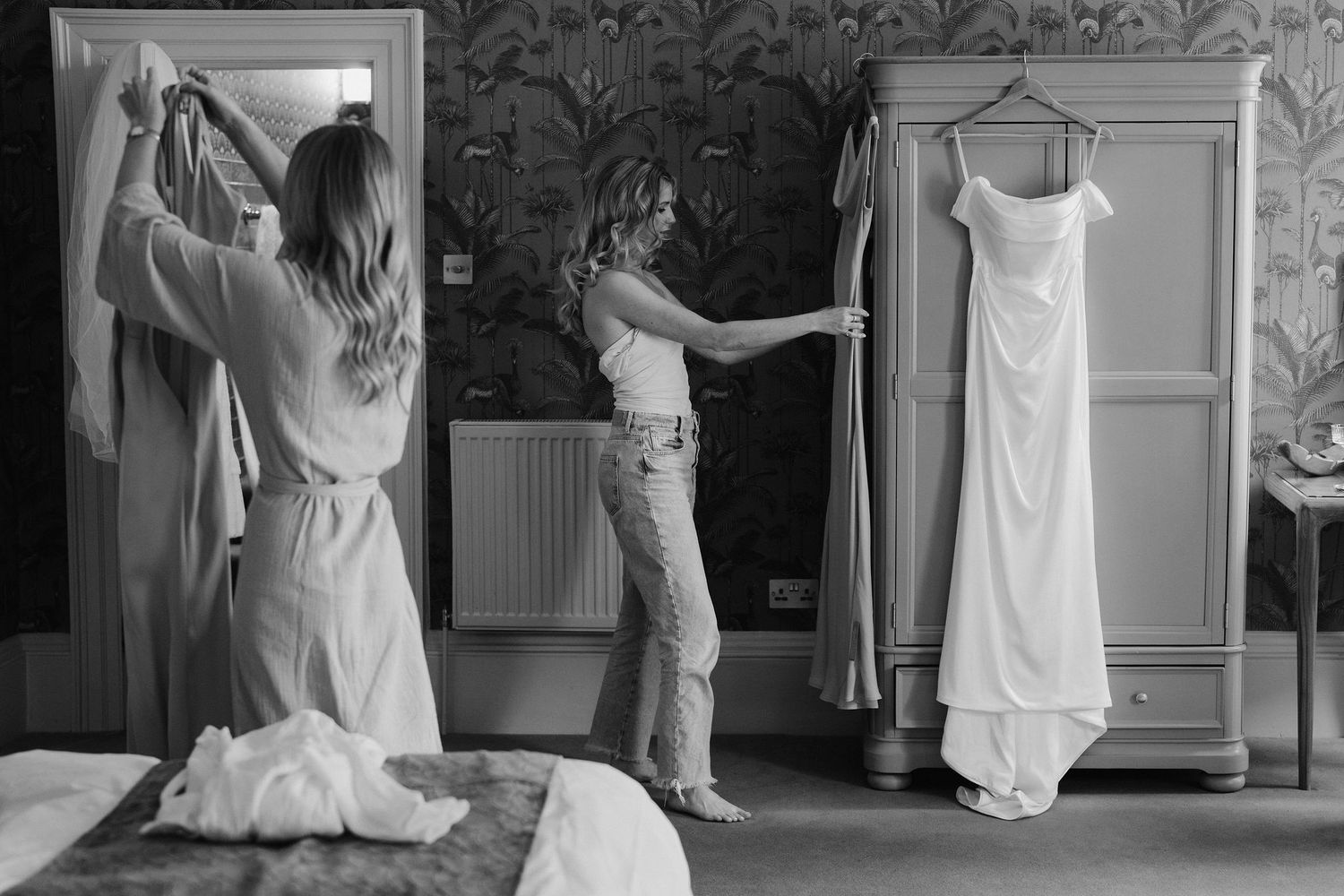 bride arranging dress at the Queensbury hotel in bath