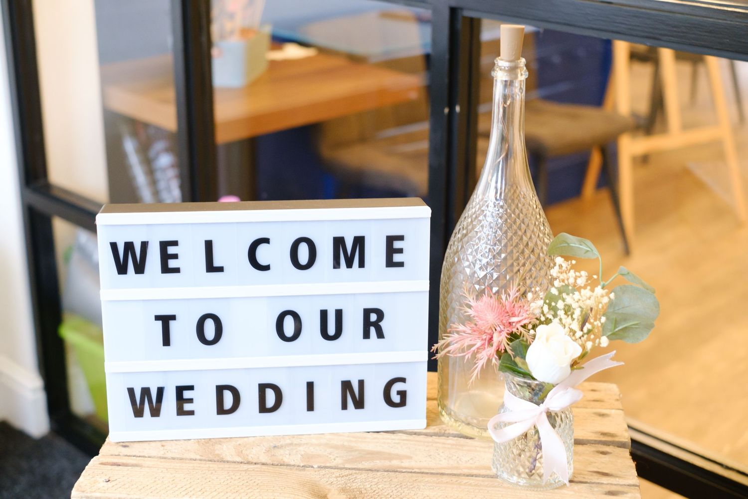 Welcome to our wedding sign with pretty flowers of roses and gypsophelia