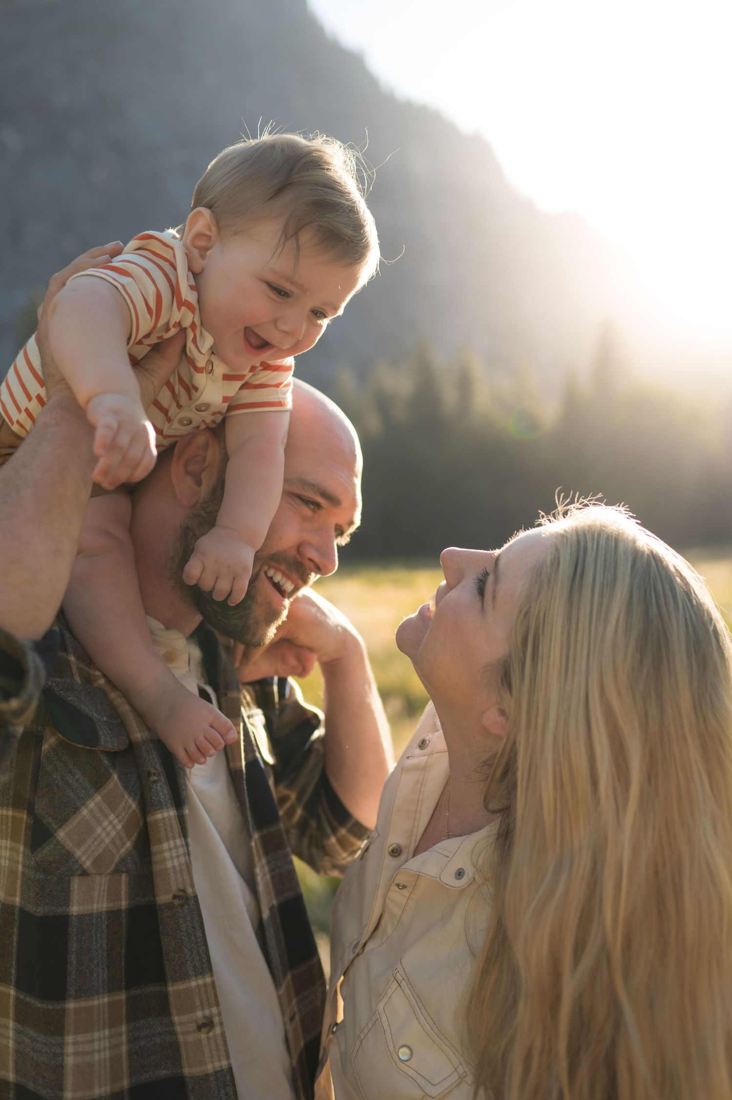 A family camping trip with their baby and dog lifestyle session in Yosemite, California during golden hour sunset light