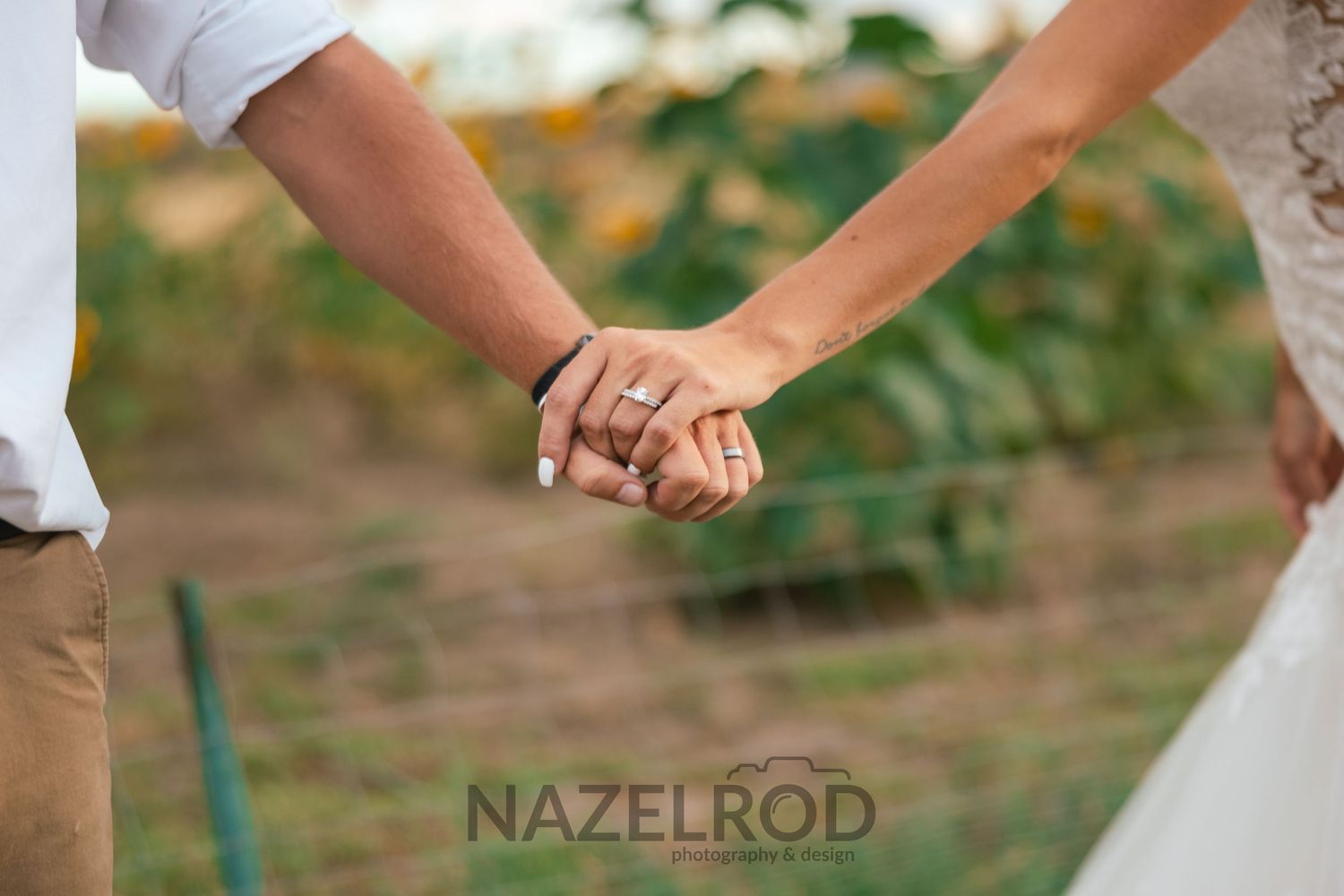 married couple holding hands