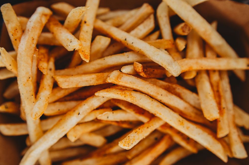 Close-up of seasoned crinkle-cut French fries