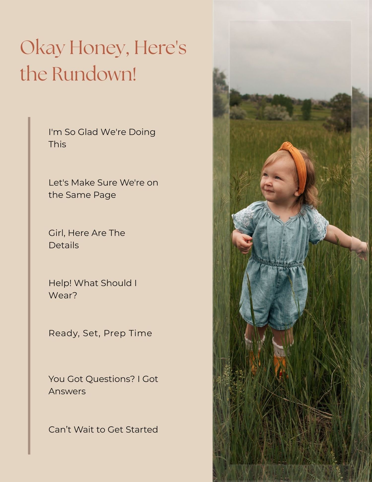 A toddler girl in a teal romper and orange headband smiles while standing in a lush green field.