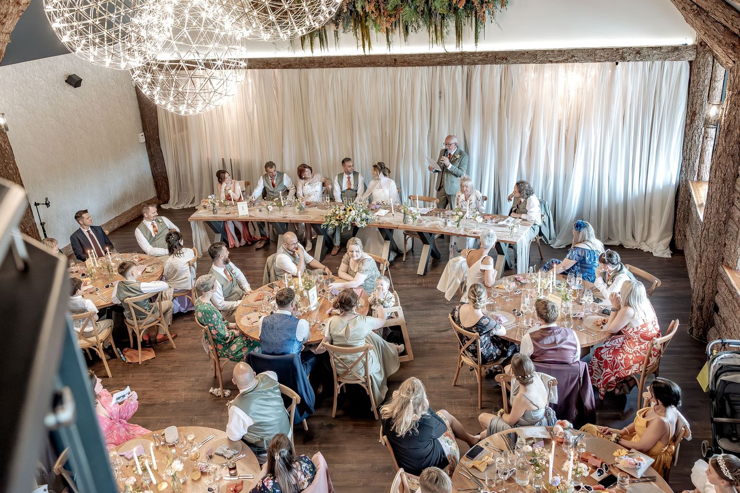 Natural wedding photography during traditional wedding speeches.