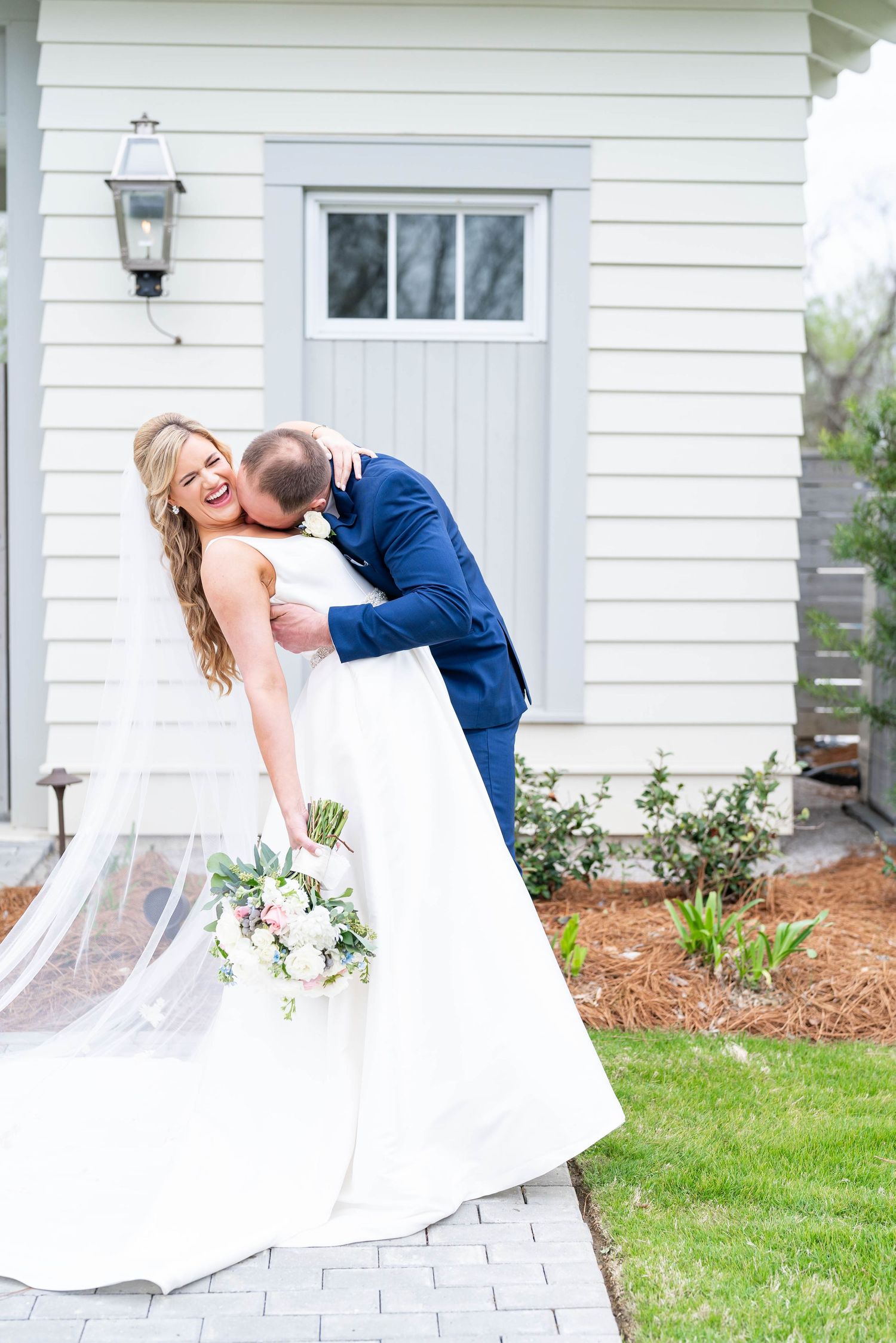 groom kisses bride wedding photographer in Blue Ridge, GA