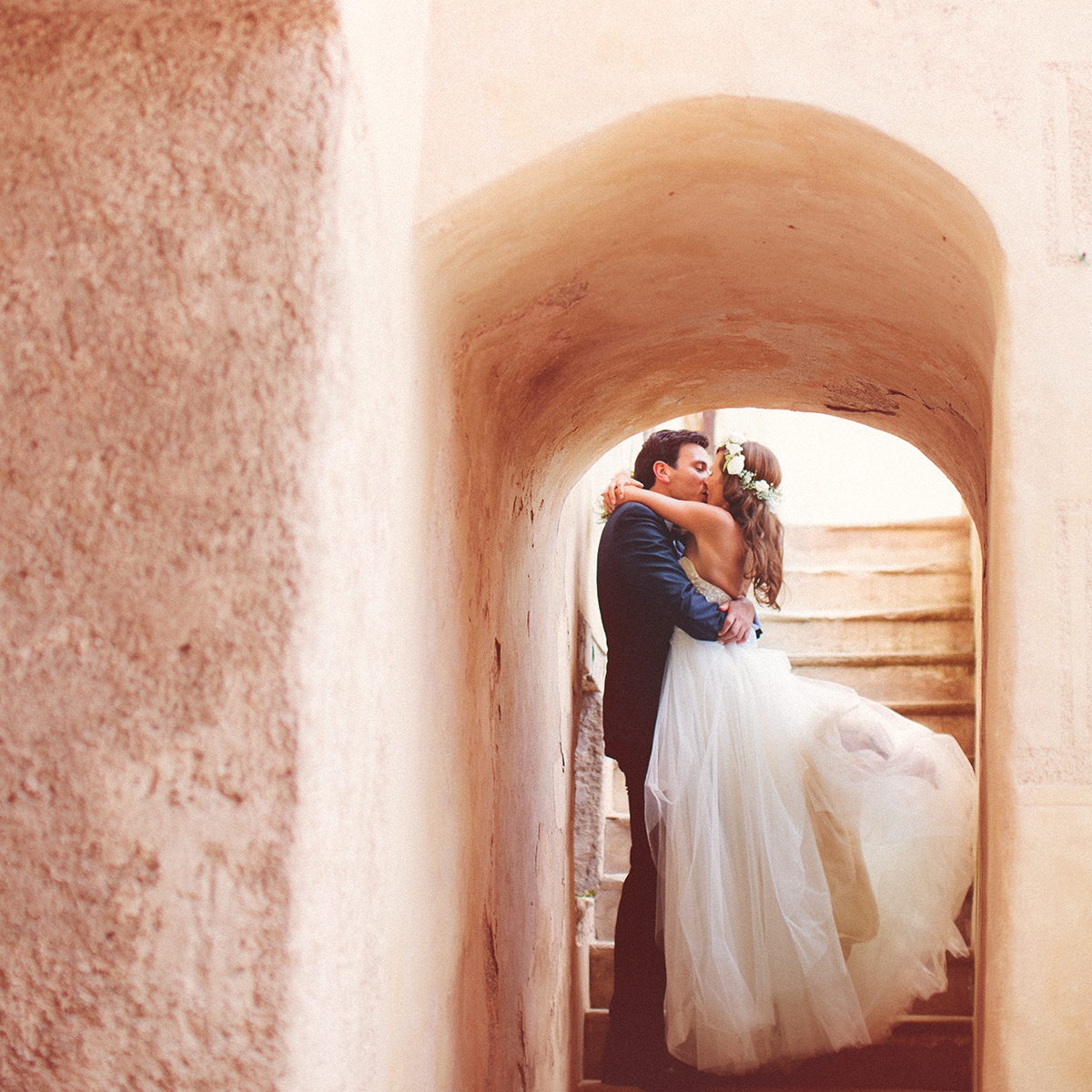 Destination wedding couple portrait in historic European architecture