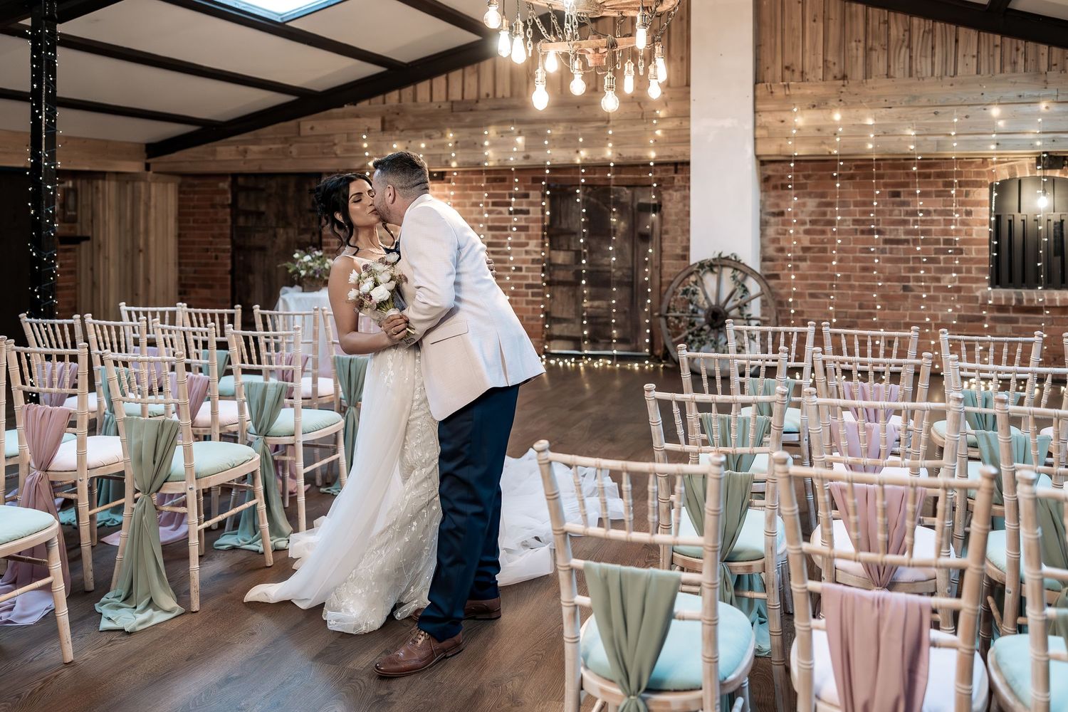Natural couple moment at Deighton Lodge Yorkshire wedding venue.