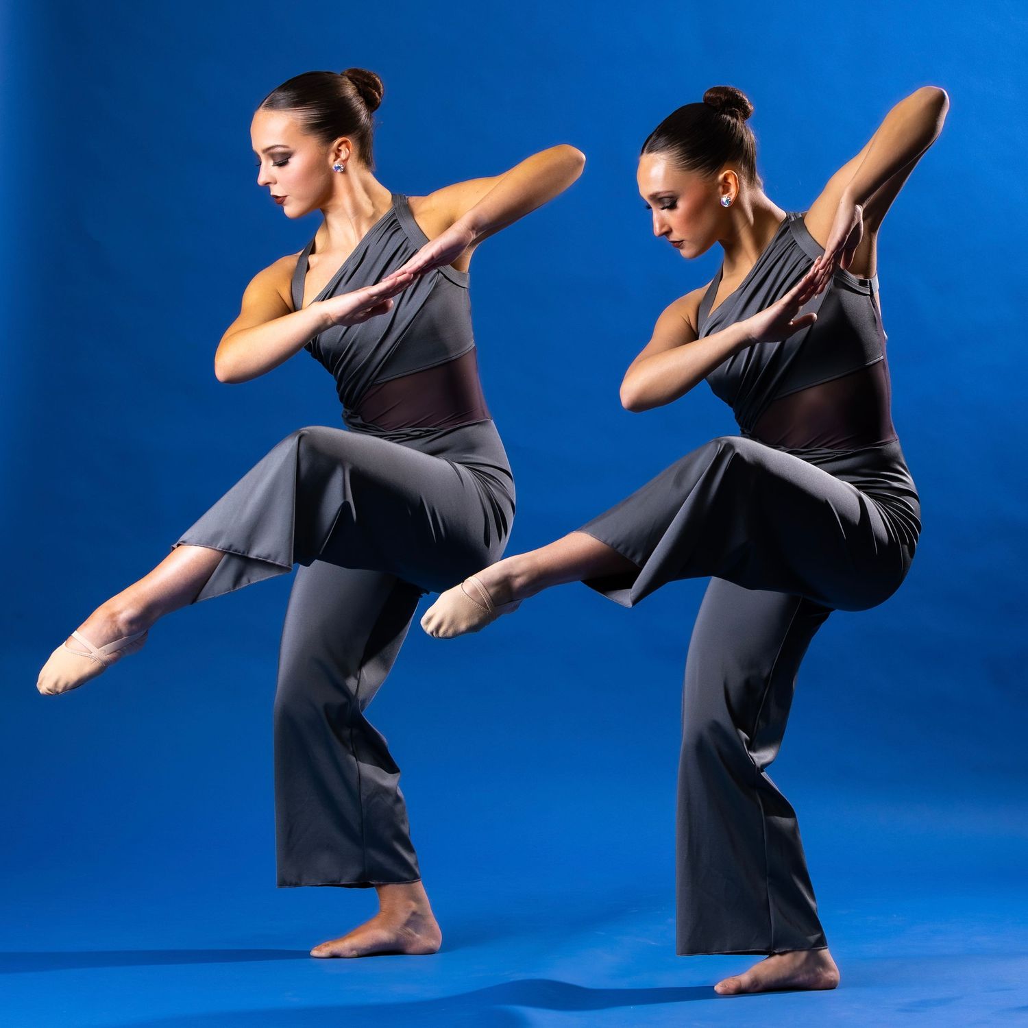 Dancer performs dynamic movement sequence in black outfit against vibrant blue backdrop.