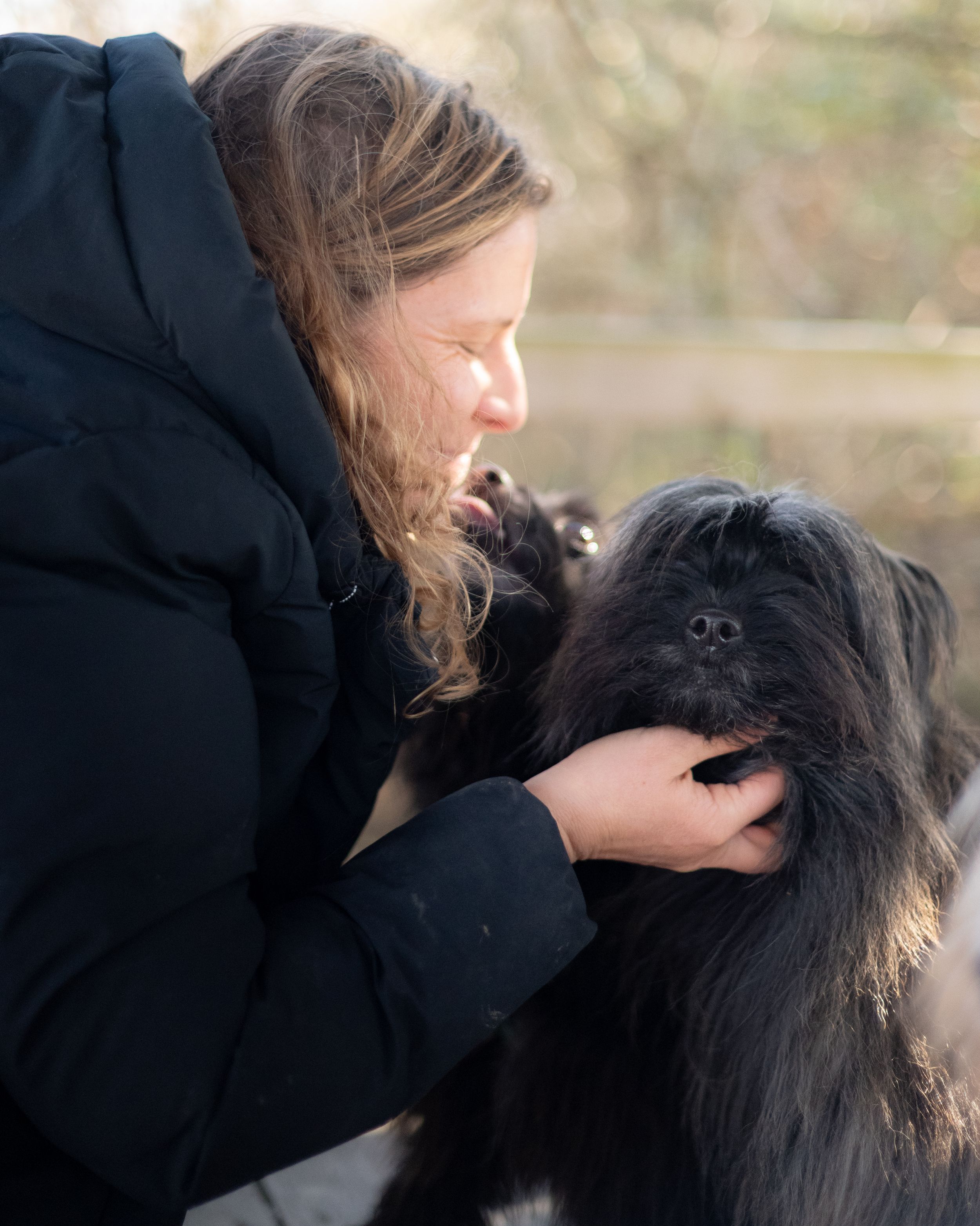 woman with her dog during a quiet photography session