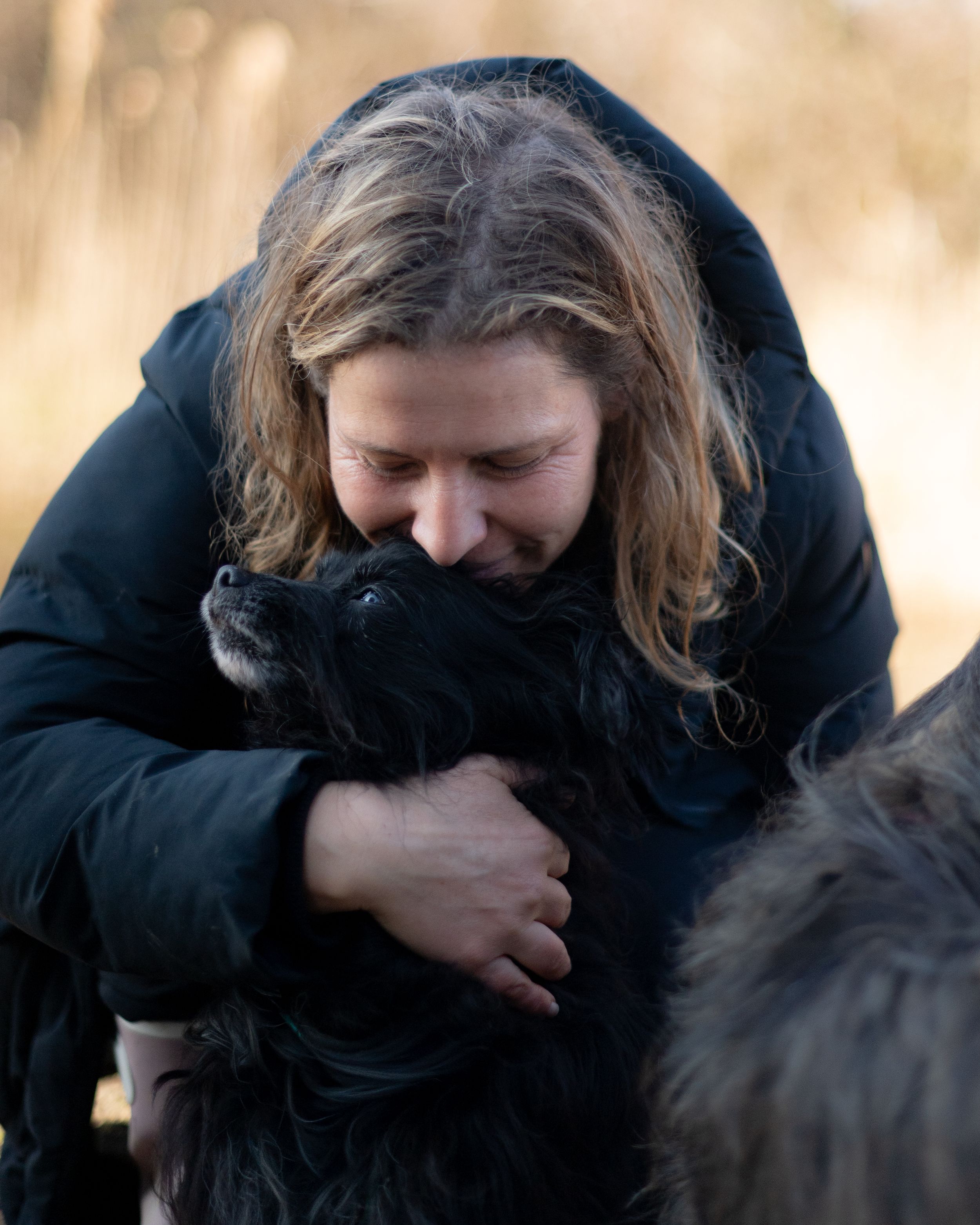 woman with her dog during a quiet photography session