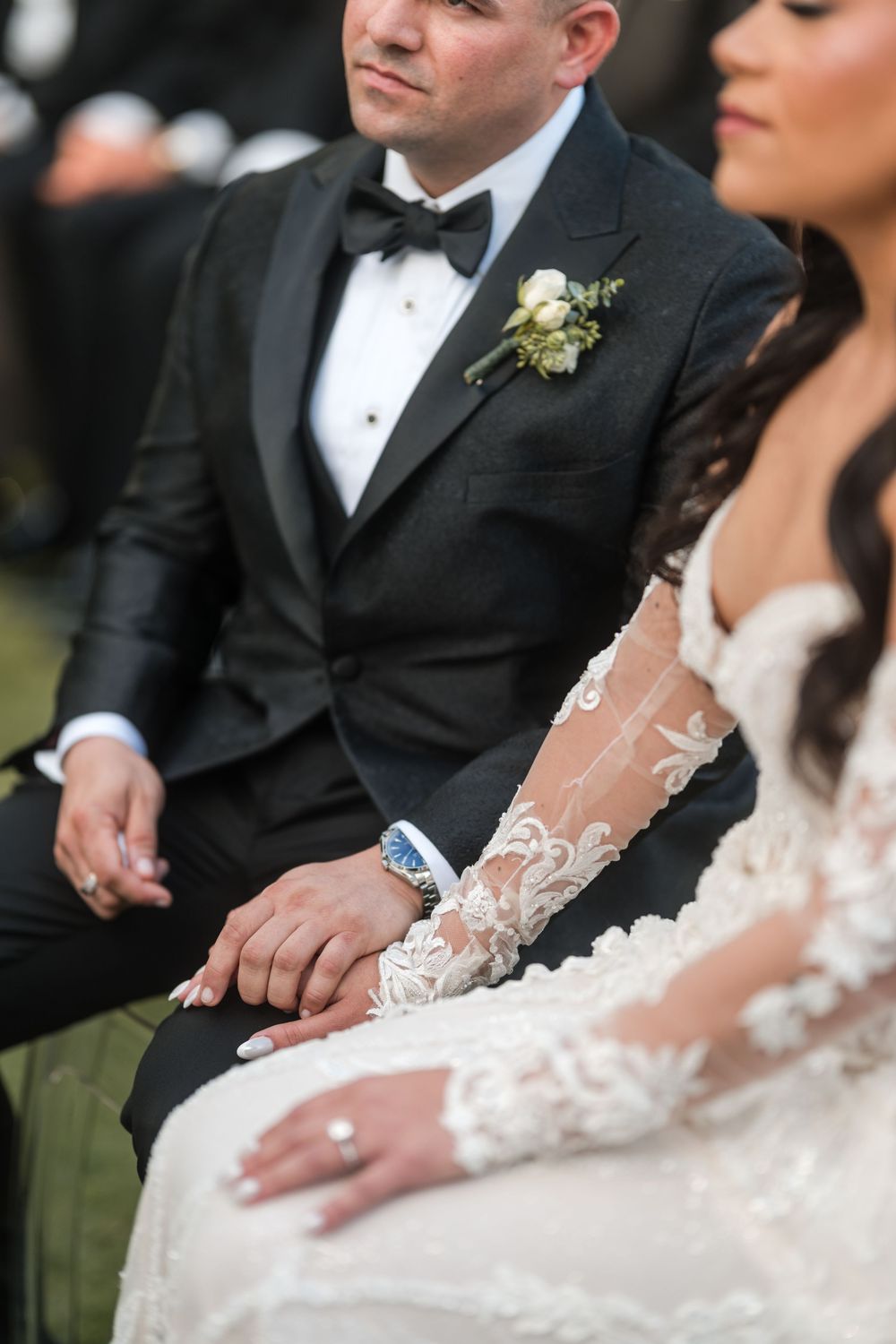 Bride and groom seated together during ceremony in Puerto Rico