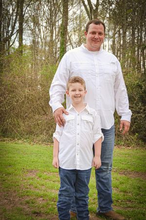 A series of outdoor family portraits showing parent and child in matching white shirts and jeans against a wooded backdrop.