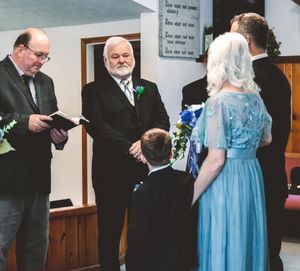 A sequence of wedding photos showing a couple in formal attire with the bride wearing a light blue dress.