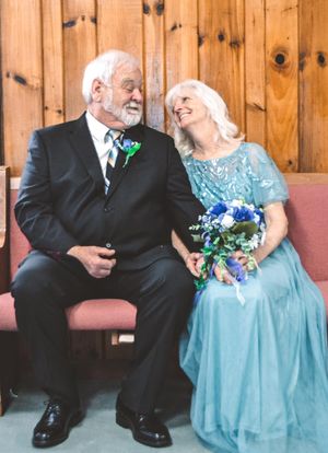 A series of candid moments showing a couple seated together, with the bride in a blue gown against wooden paneling.