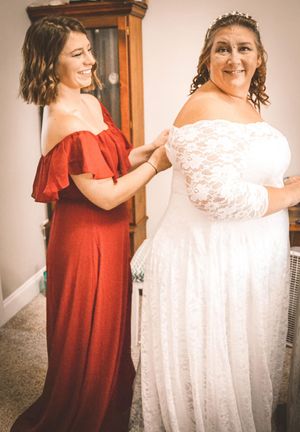 A series of joyful moments showing someone in a red dress helping with a white lace wedding gown.