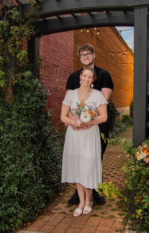A series of wedding photos showing close-up details of bridal bouquets and shoes on a brick paved pathway.