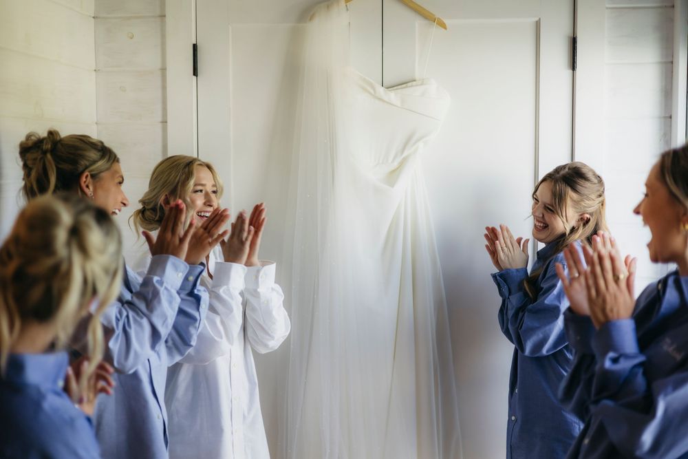 A sequence of photos showing people reacting with surprise and covering their faces in a white room.