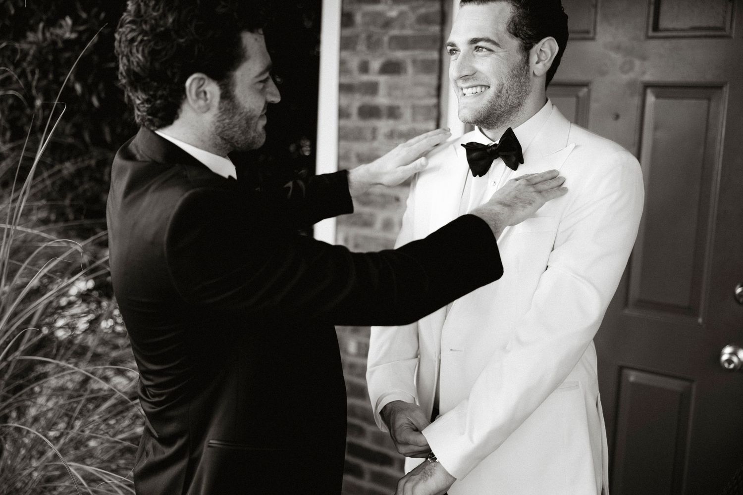 A black and white photo collage showing candid moments from a formal wedding celebration with guests in tuxedos.