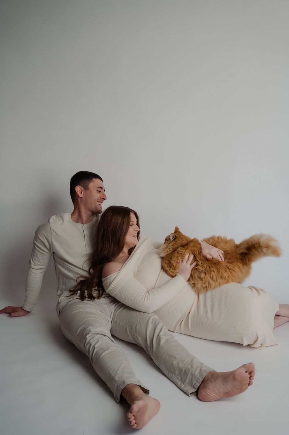 maternity studio photography with cat