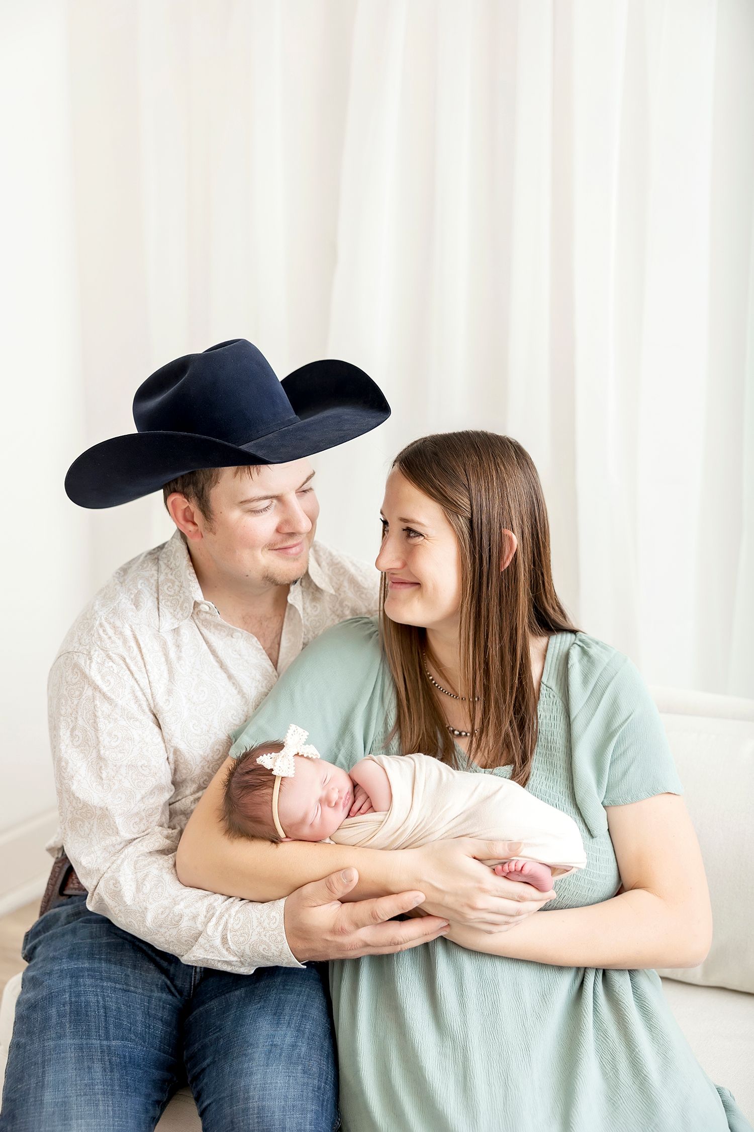 Sleeping newborn baby photographed during studio newborn session in Clear Lake Iowa