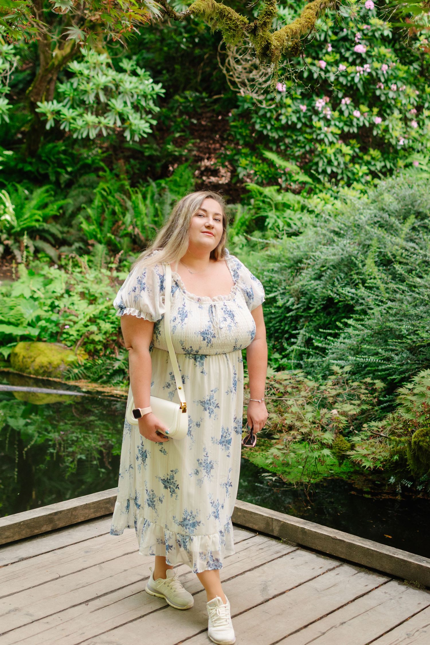 High school senior posing near pond at Washington Park Arboretum