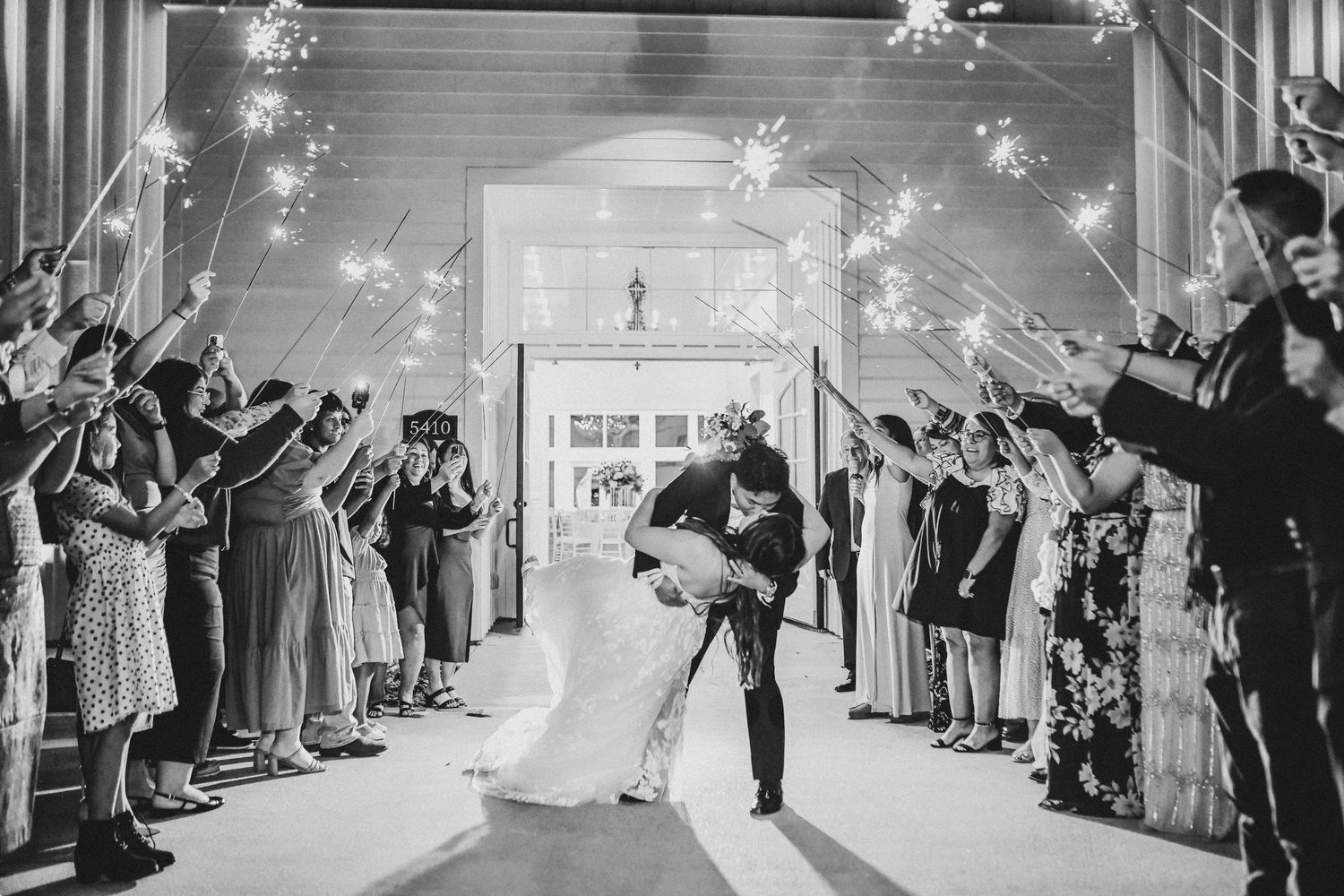 Romantic nighttime portrait of newlyweds at Firefly Gardens