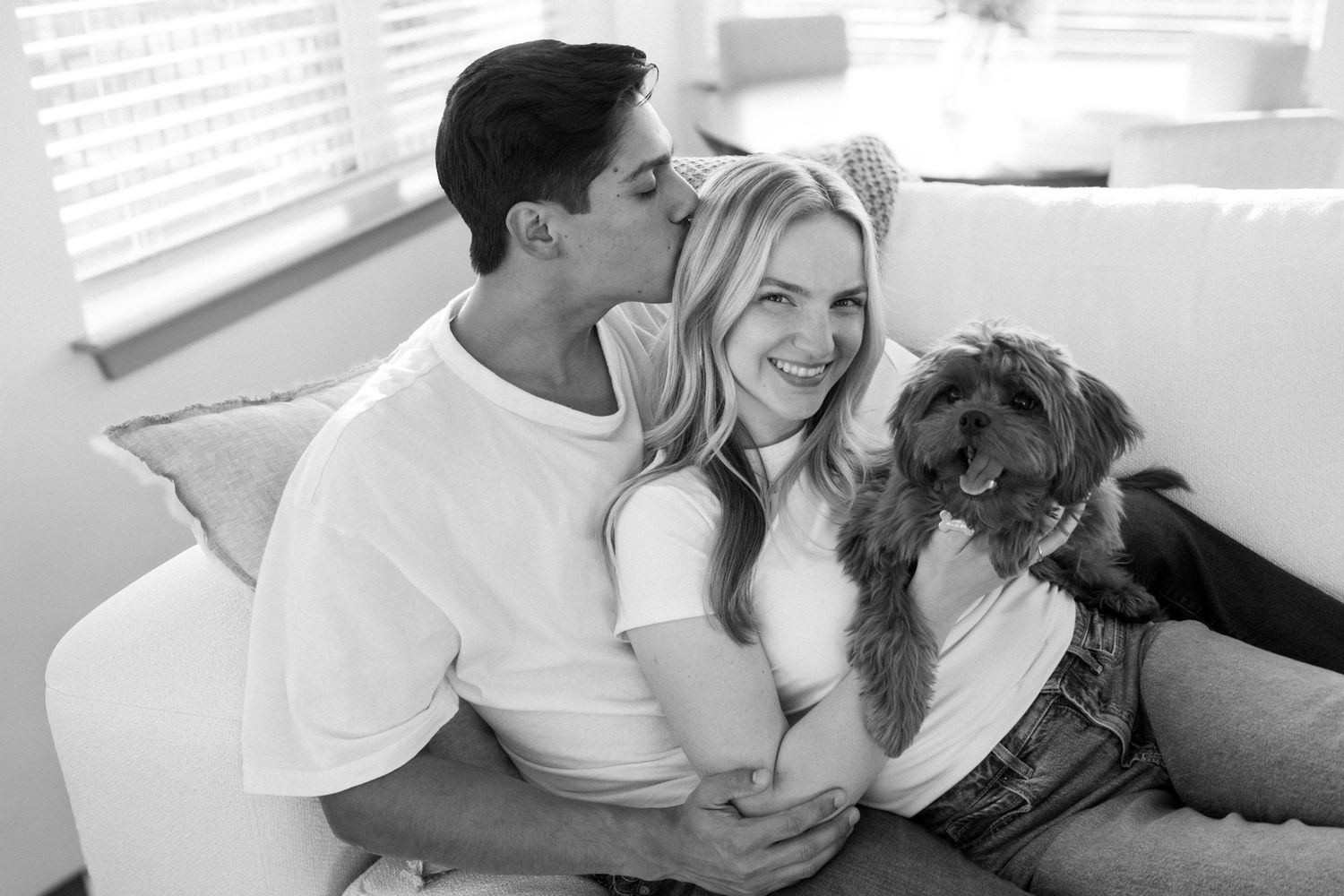 couple holding dog