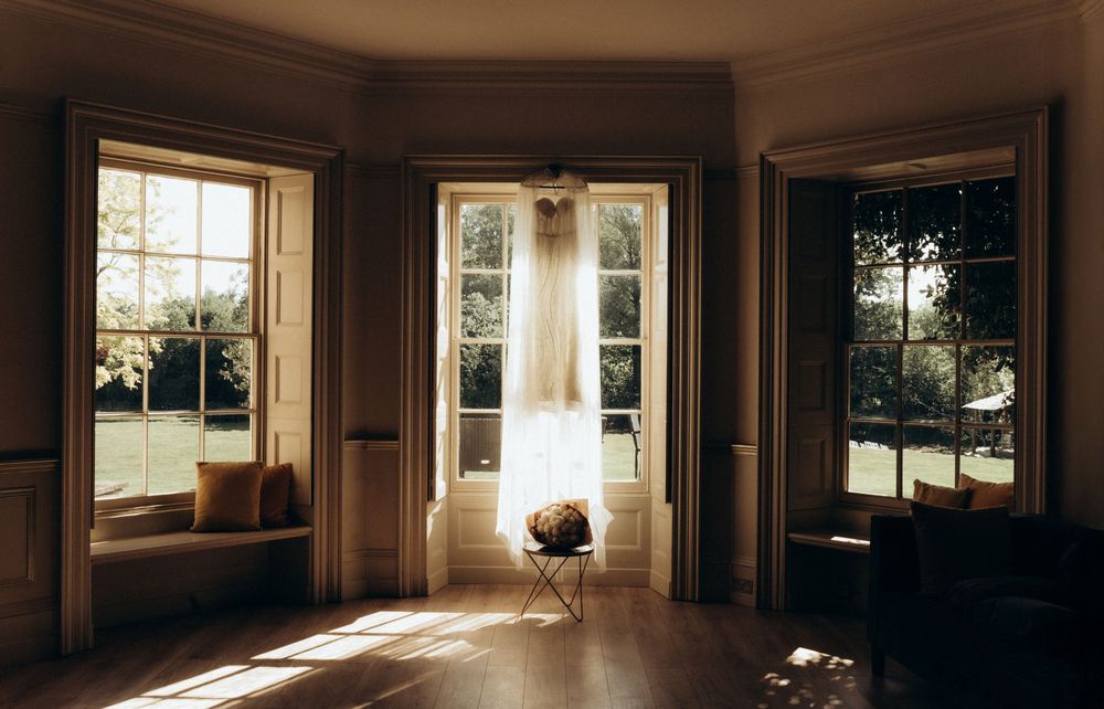 Warm-toned interior panorama series showing sunlight casting long shadows through multiple windows in an empty room.