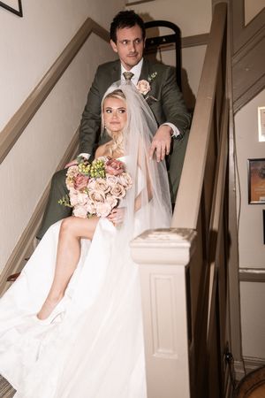 A couple in wedding attire poses on a staircase with white walls in an artistic multi-panel composition.